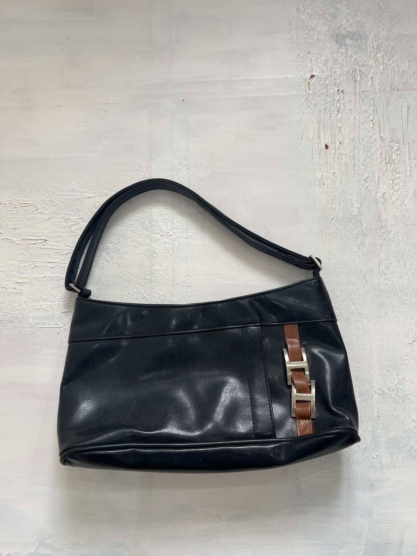 DINNER PARTY | black leather shoulder bag