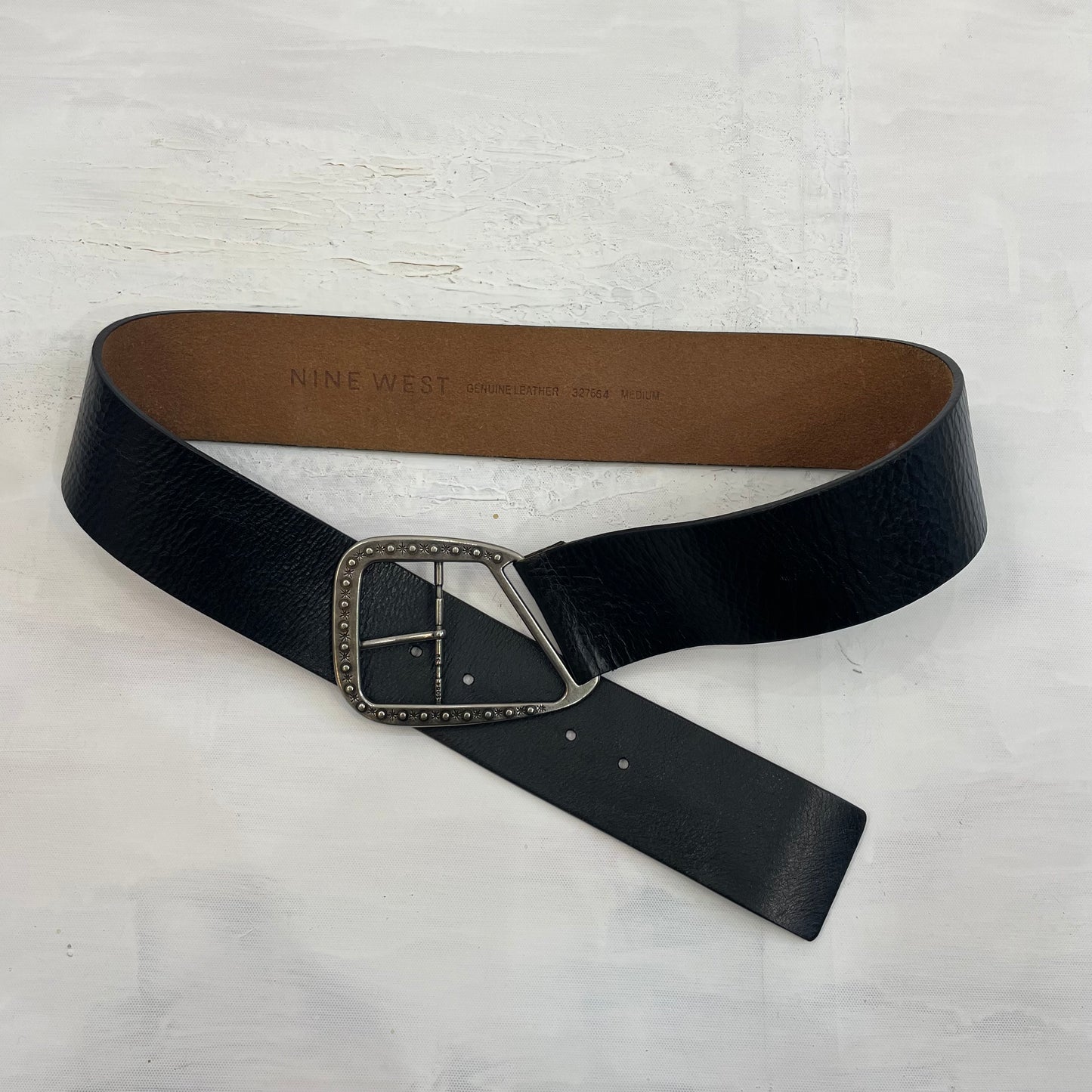 BEST PICKS | black leather belt with silver buckle