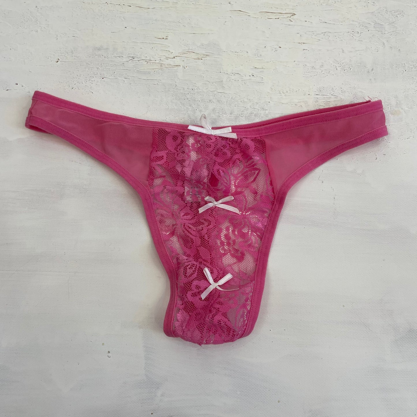 GIRL CORE DROP | small pink lace / mesh thong with bow detail