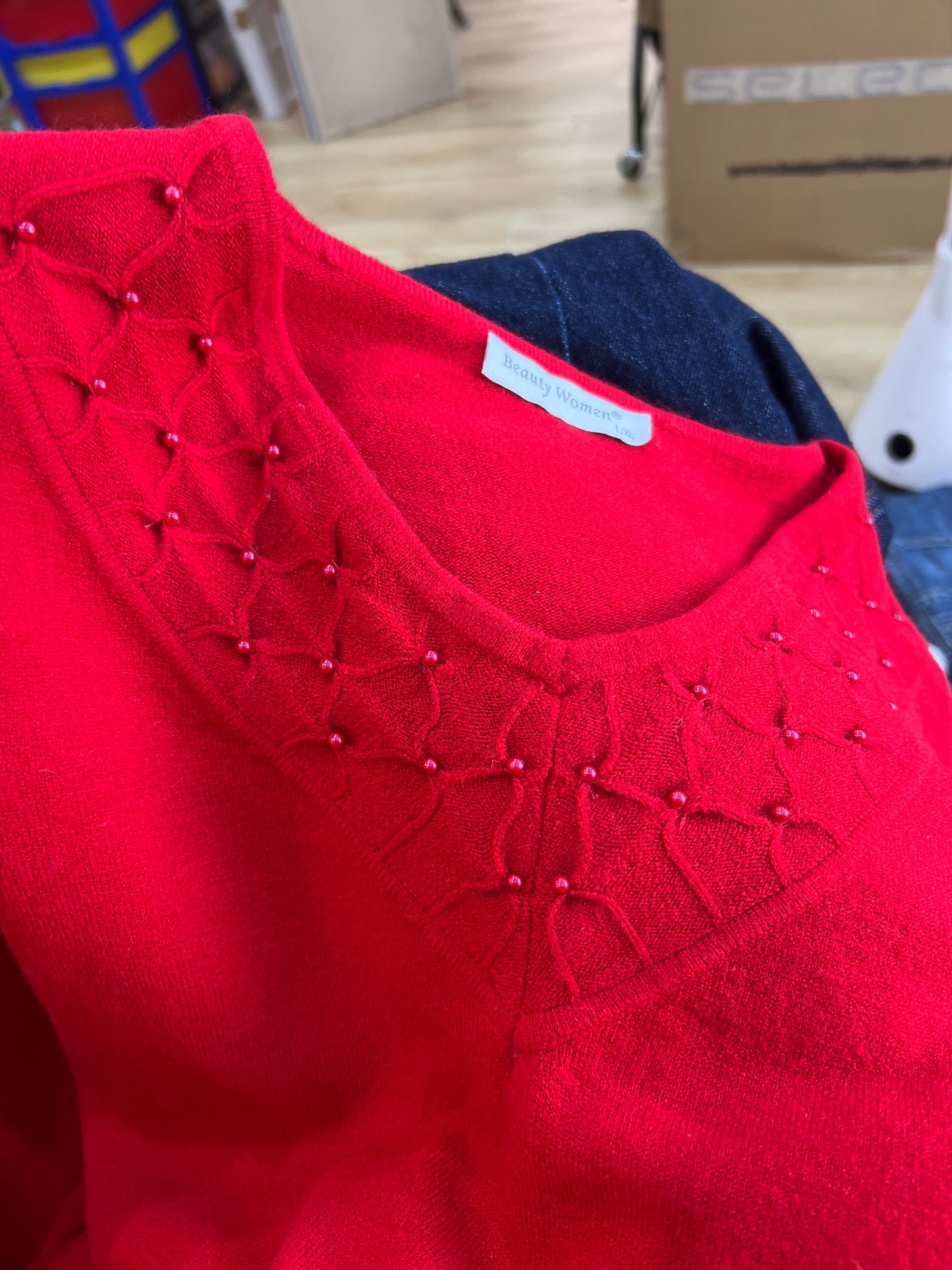 WINTER TRENDS | medium red jumper with pearl neckline