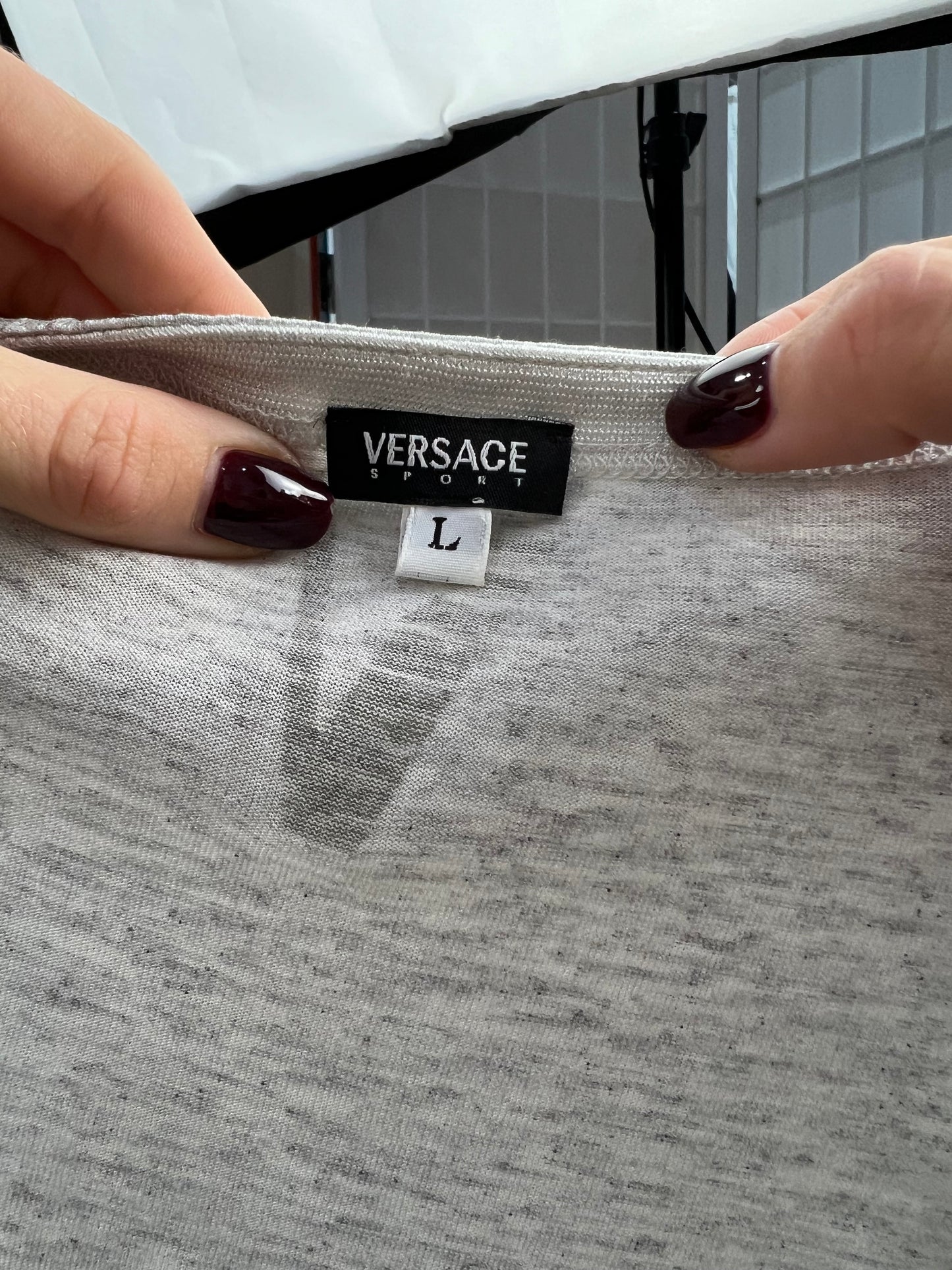 DATE NIGHT | medium white and silver versace shiny top