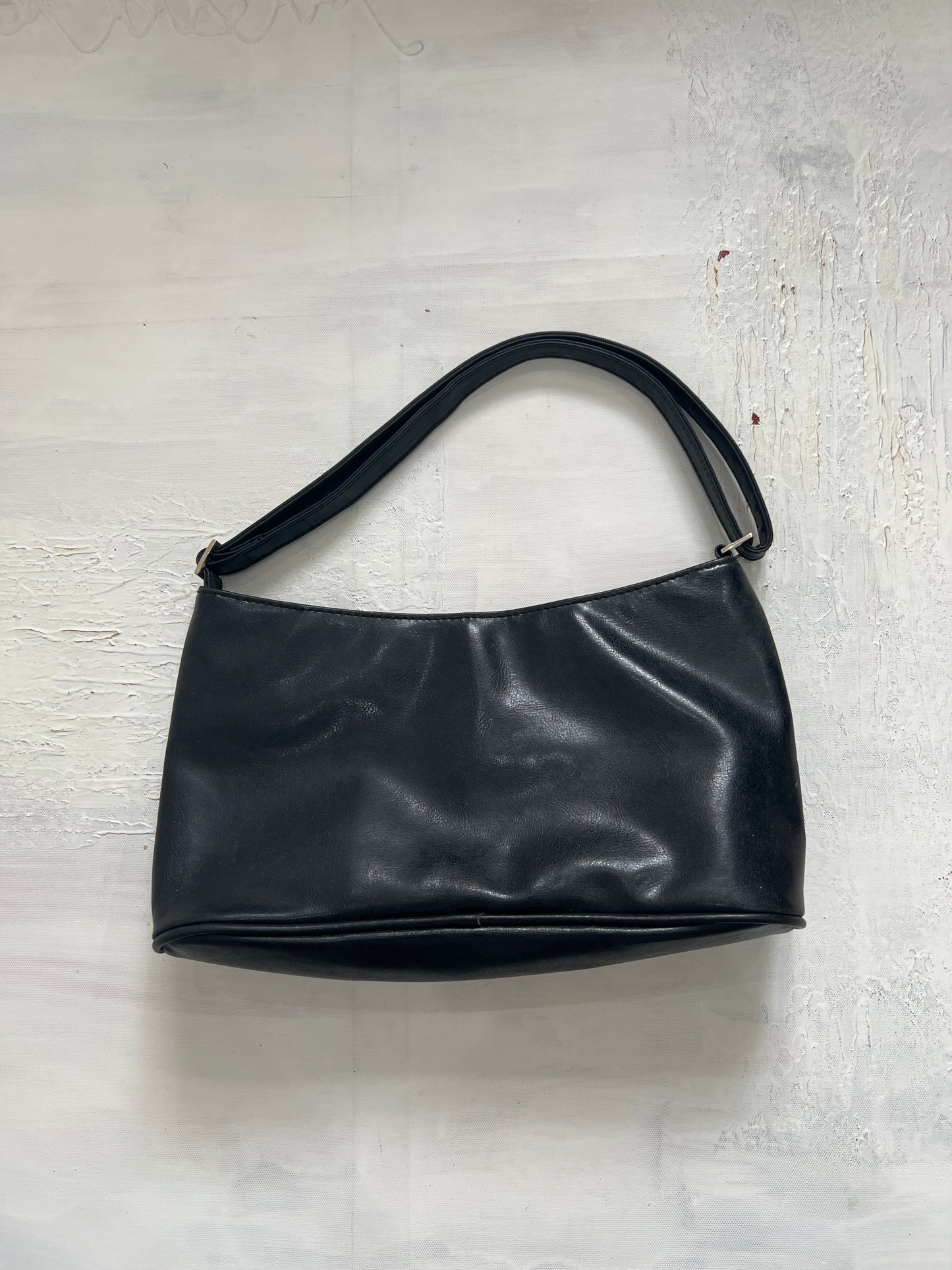 DINNER PARTY | black leather shoulder bag