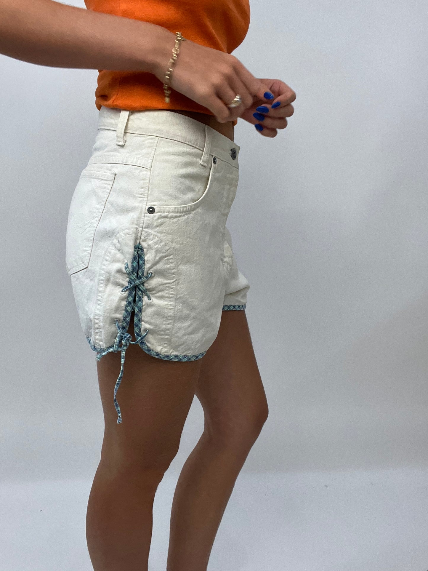 FRUITY DROP | small white denim shorts with adjustable blue checkered tie on the side