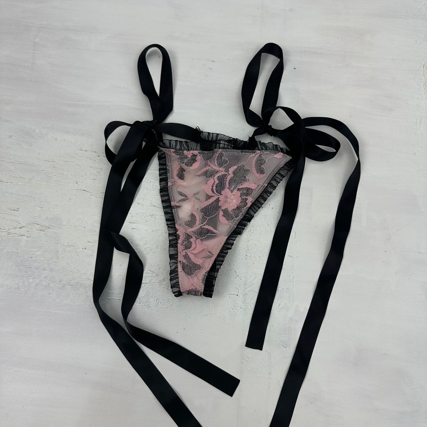 ADDISON RAE DROP | small black and pink lace underwear with bow side ties