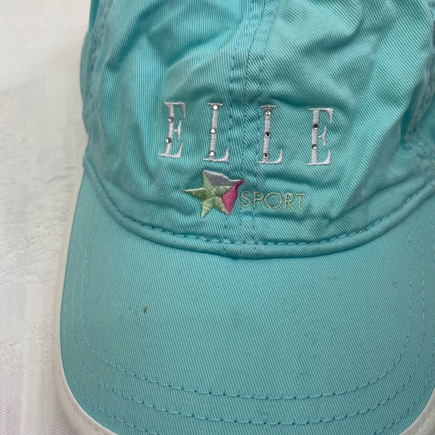 ELEVATED SPORTSWEAR DROP | light blue elle visor style hat