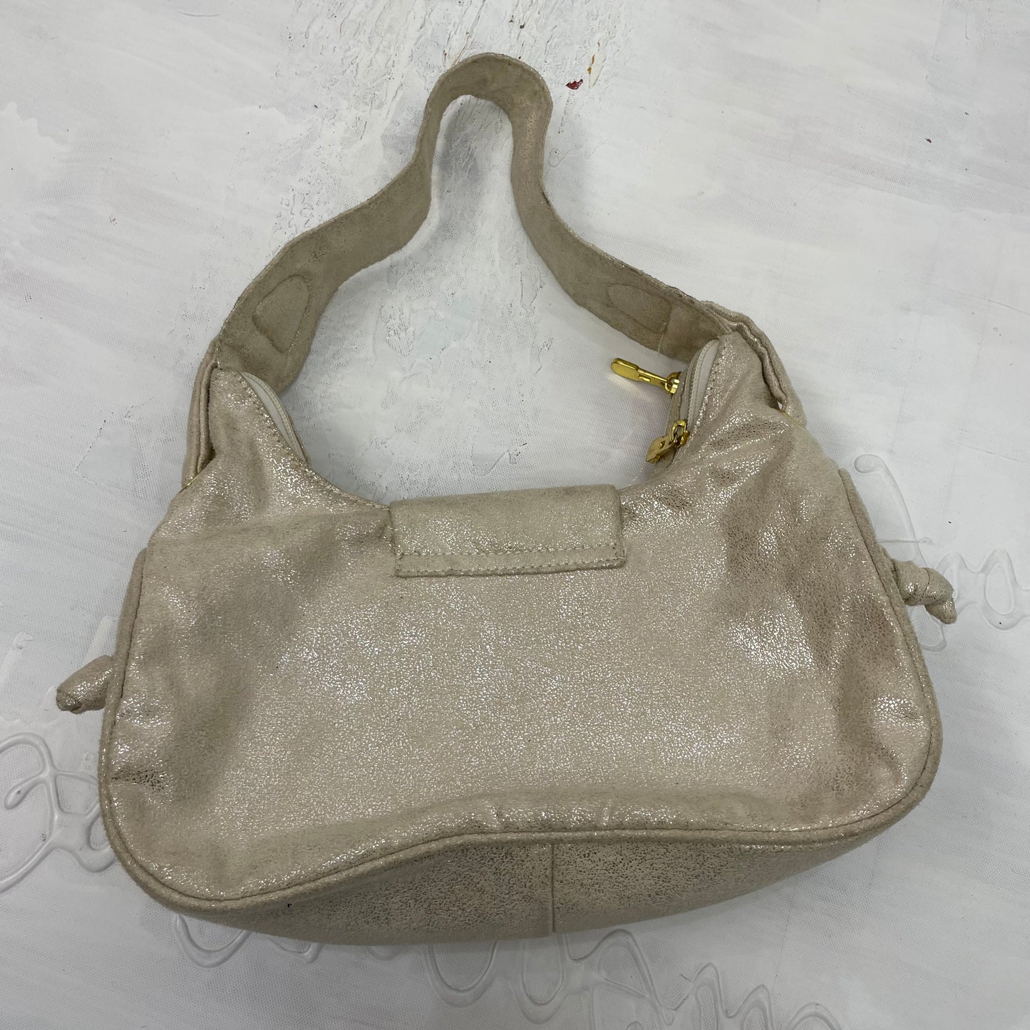 MOB WIFE DROP | beige metallic shoulder bag with gold embellishments