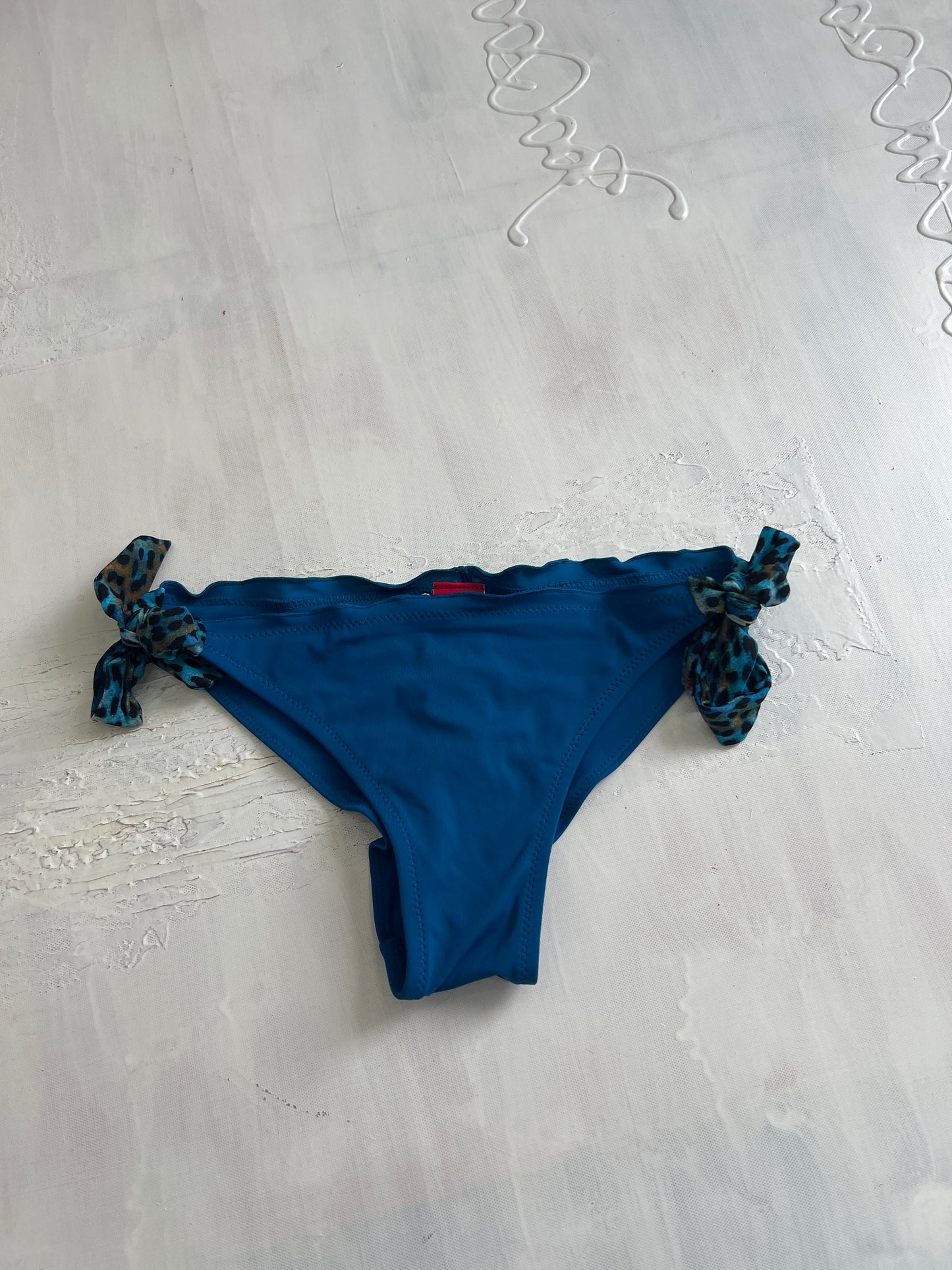 BRITISH SUMMER GIRL DROP | medium blue bikini bottoms with leopard print ties