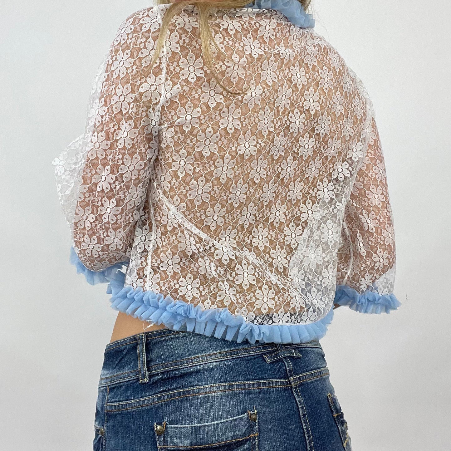 GIRL CORE DROP | small white lace cardigan with blue ruffle detail