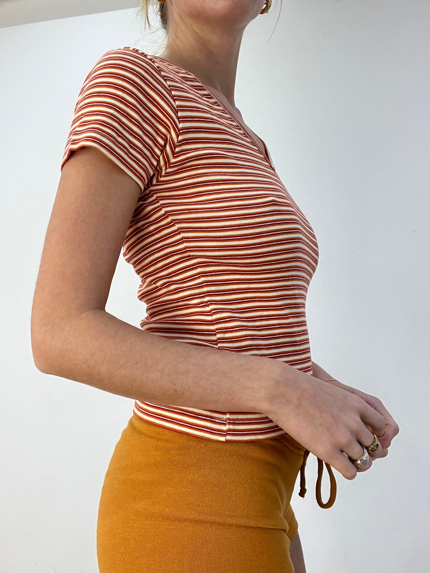 BEST PICKS | medium orange and pink striped v neck top