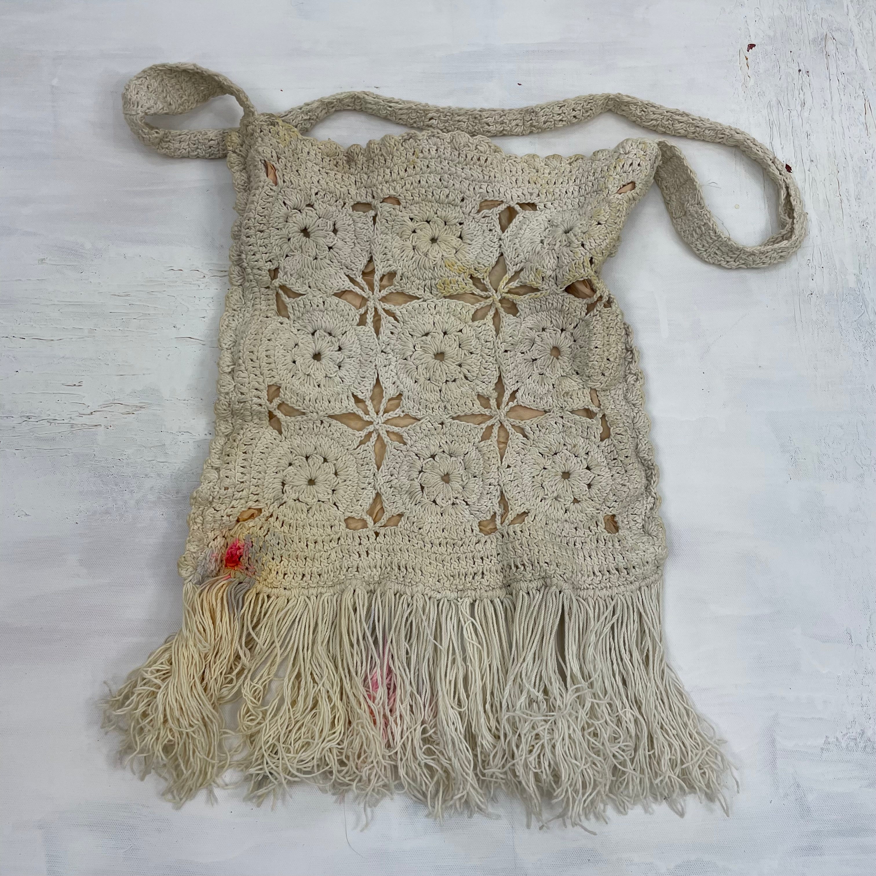 Cream vintage factory purse with fringe detail