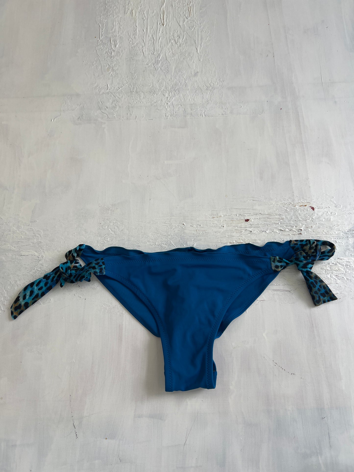 BRITISH SUMMER GIRL DROP | medium blue bikini bottoms with leopard print ties