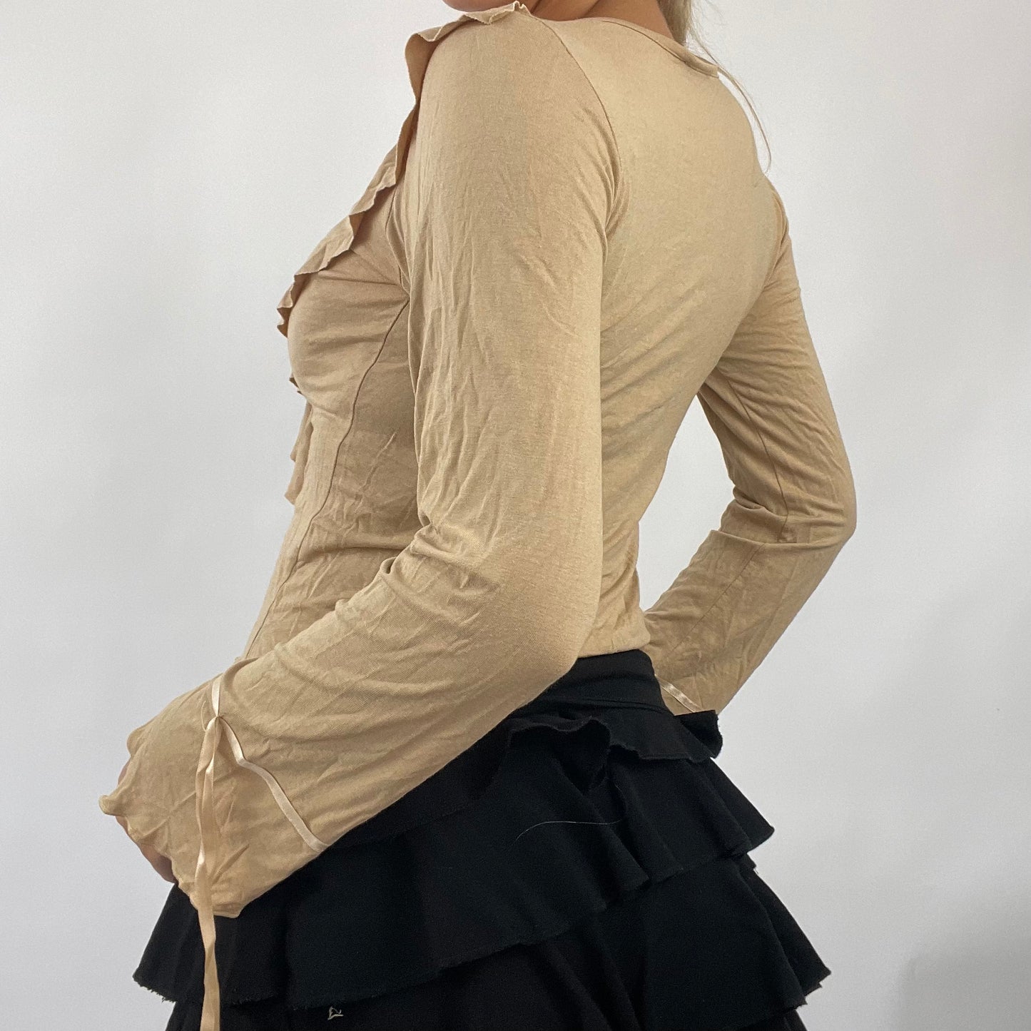 💻 BOHO GIRL DROP | small light brown beige long sleeved top with brown lace up front and ruffle details