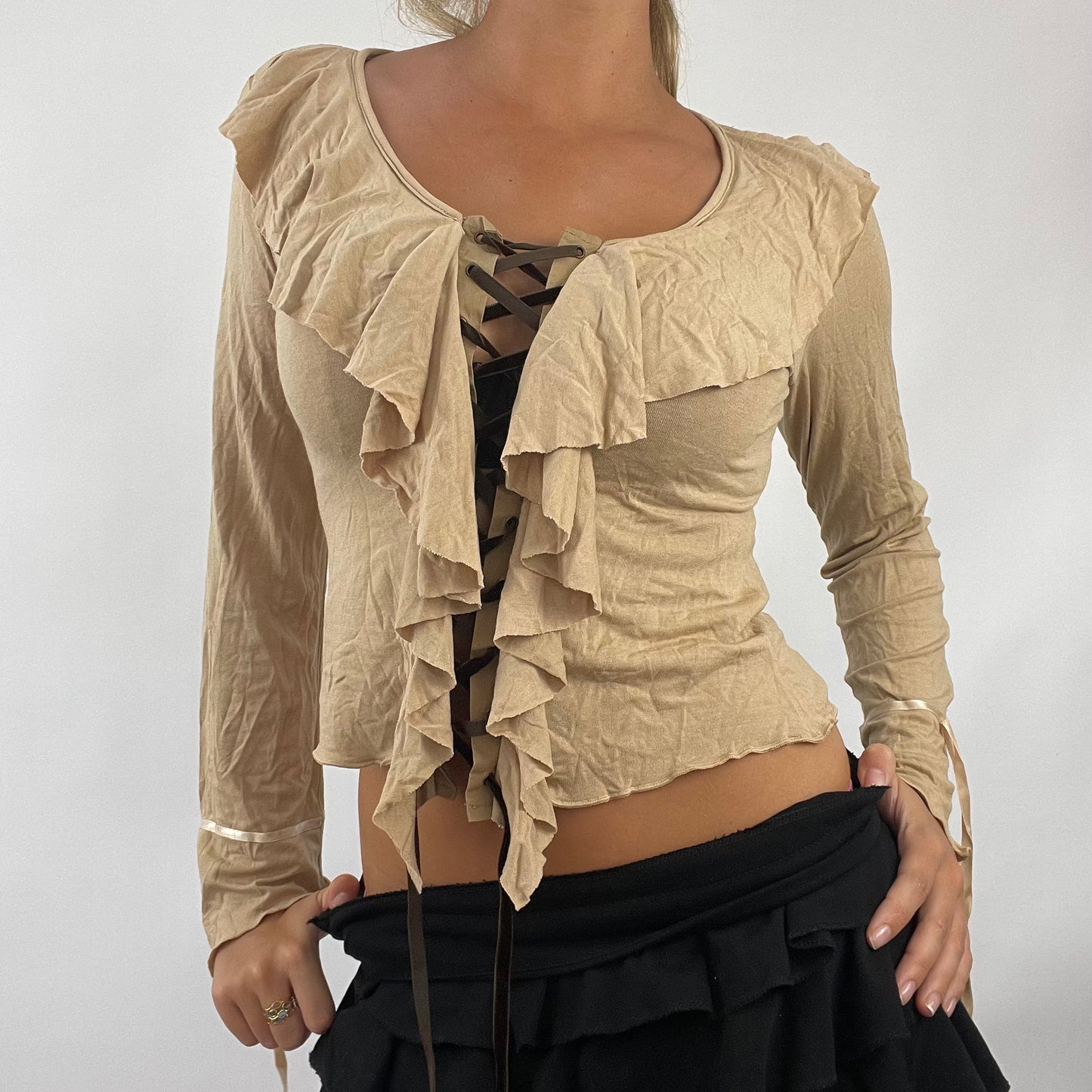 💻 BOHO GIRL DROP | small light brown beige long sleeved top with brown lace up front and ruffle details